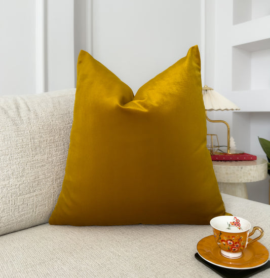 Mustard pillow on a sofa