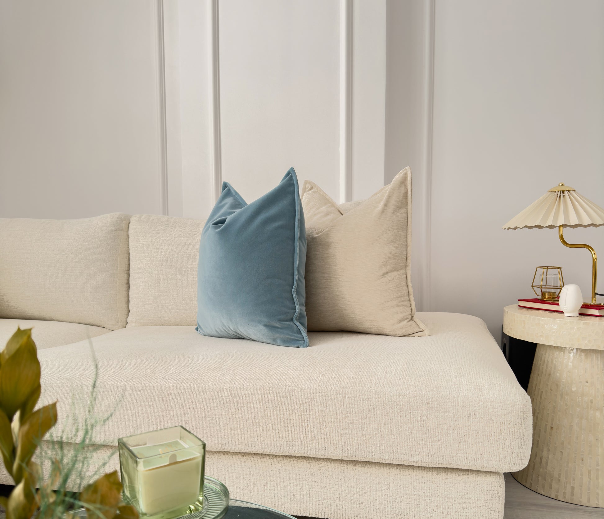 a living room with a couch and a table